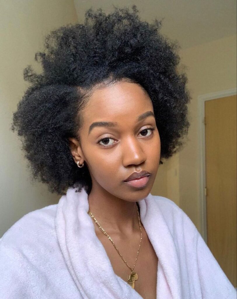 a girl with type 4 hair