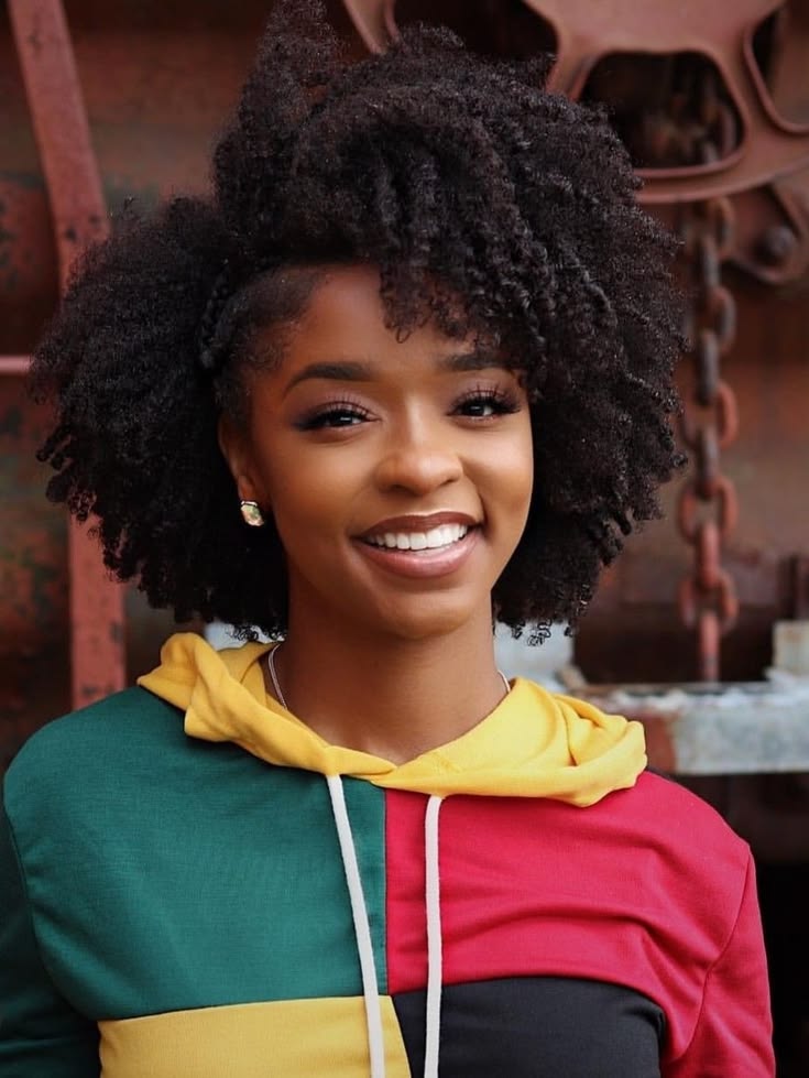 a girl with 4C hair