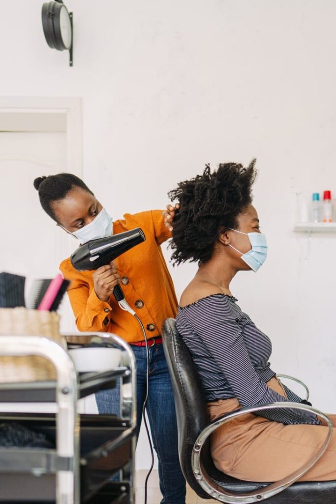someone that air dries her hair with electric dryer