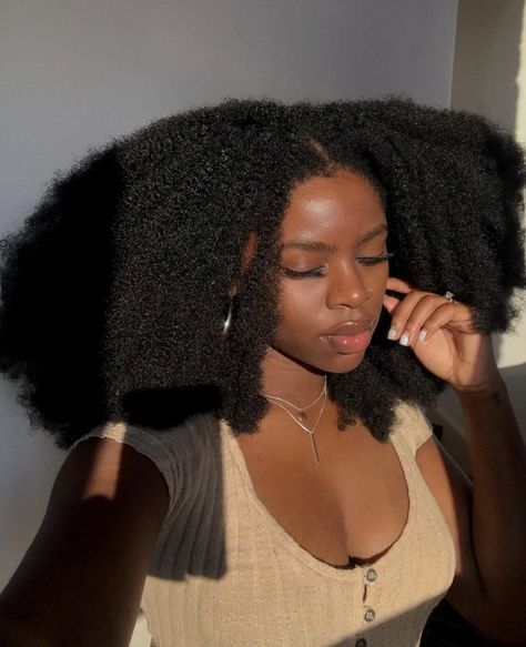 a girl with full afro hair