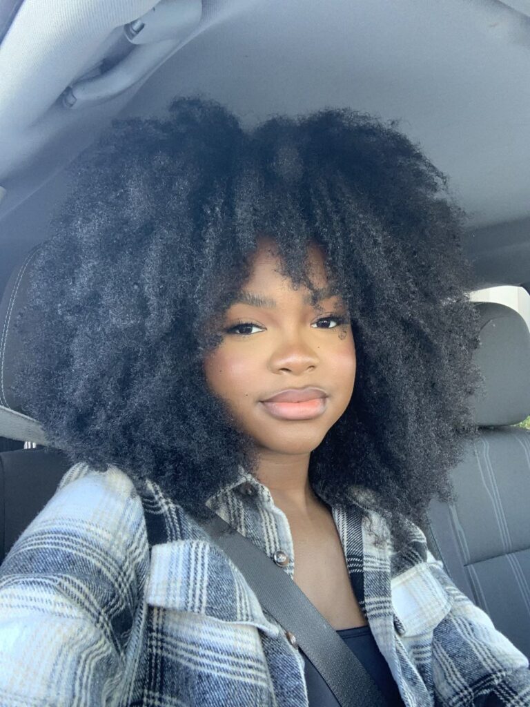 a girl with a full afro hair