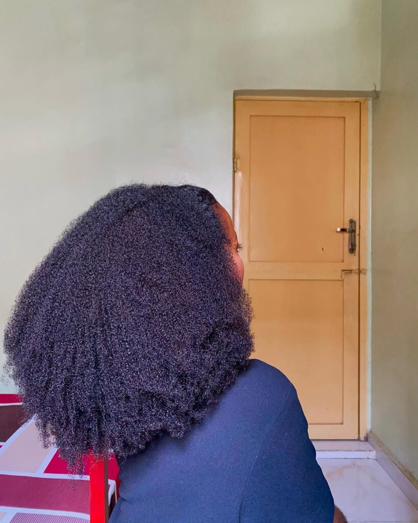 a lady showing her hair from the back
