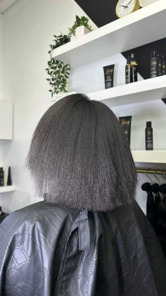 a lady that got her hair trimmed