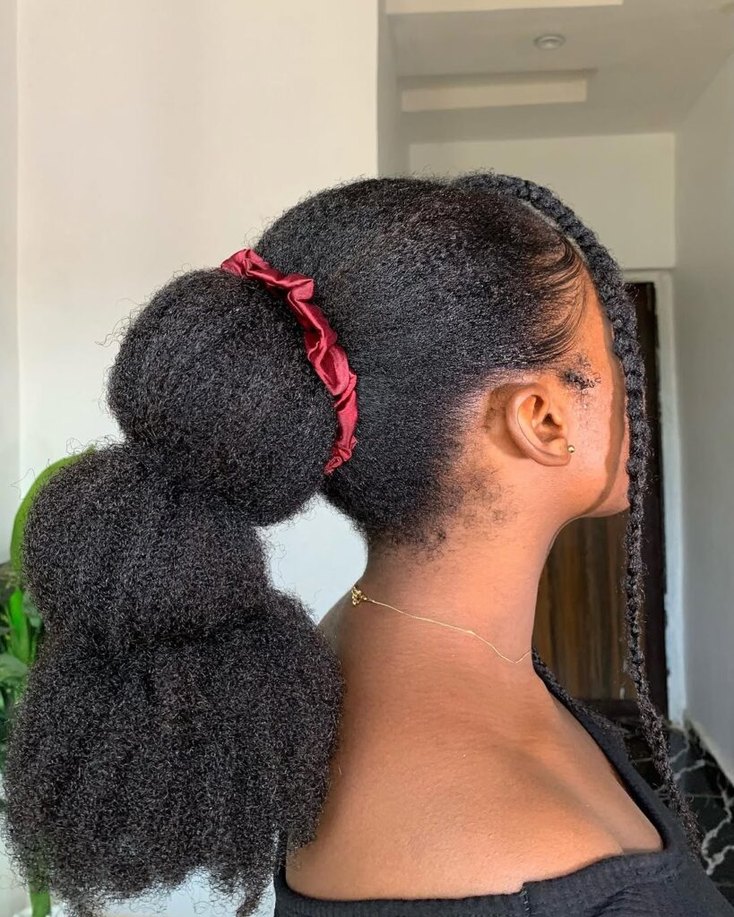 a lady with a long natural hair