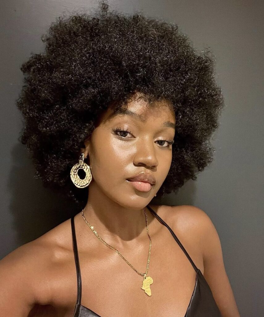 a pretty girl with type 4 hair