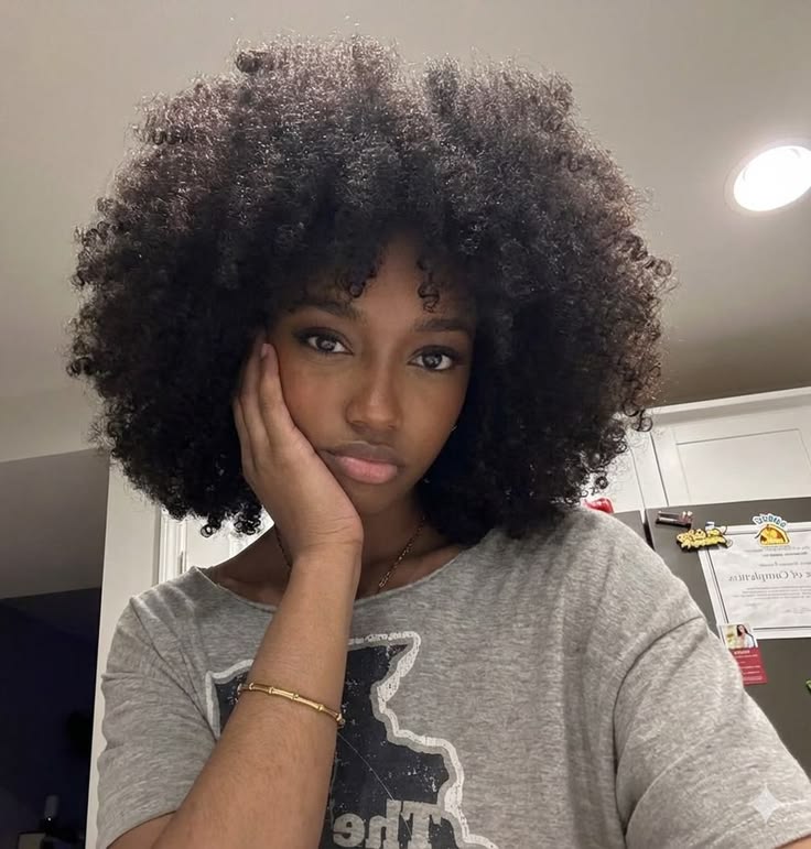 a girl with afro hair