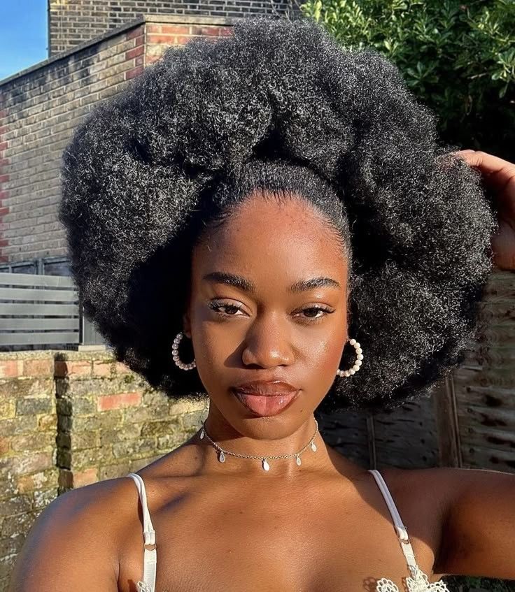 a pretty girl with healthy afro hair