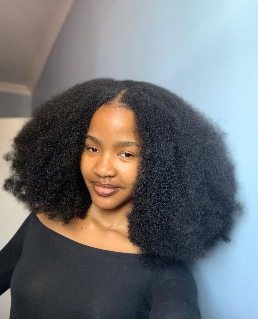 a girl with afro hair