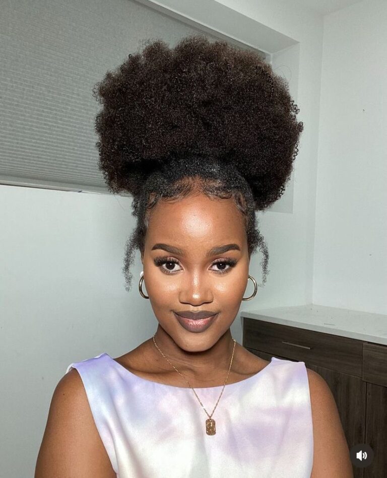 a girl with afro puff