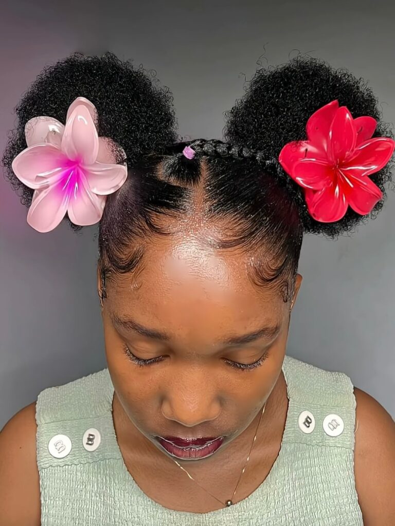 a girl with double afro puff with accessories hairstyle
