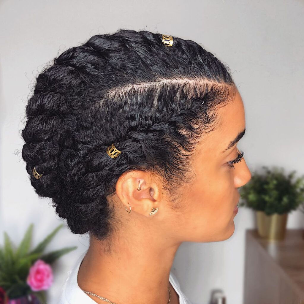 a fair girl with bobby pins on her flat twist