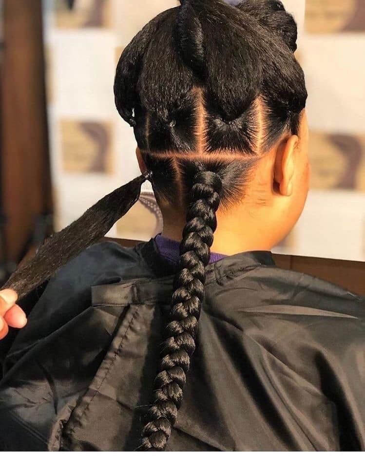 someone braiding big box braids