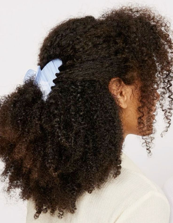 clipped curly hair