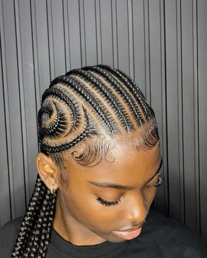 a lady with a cornrows beautiful hairstyle