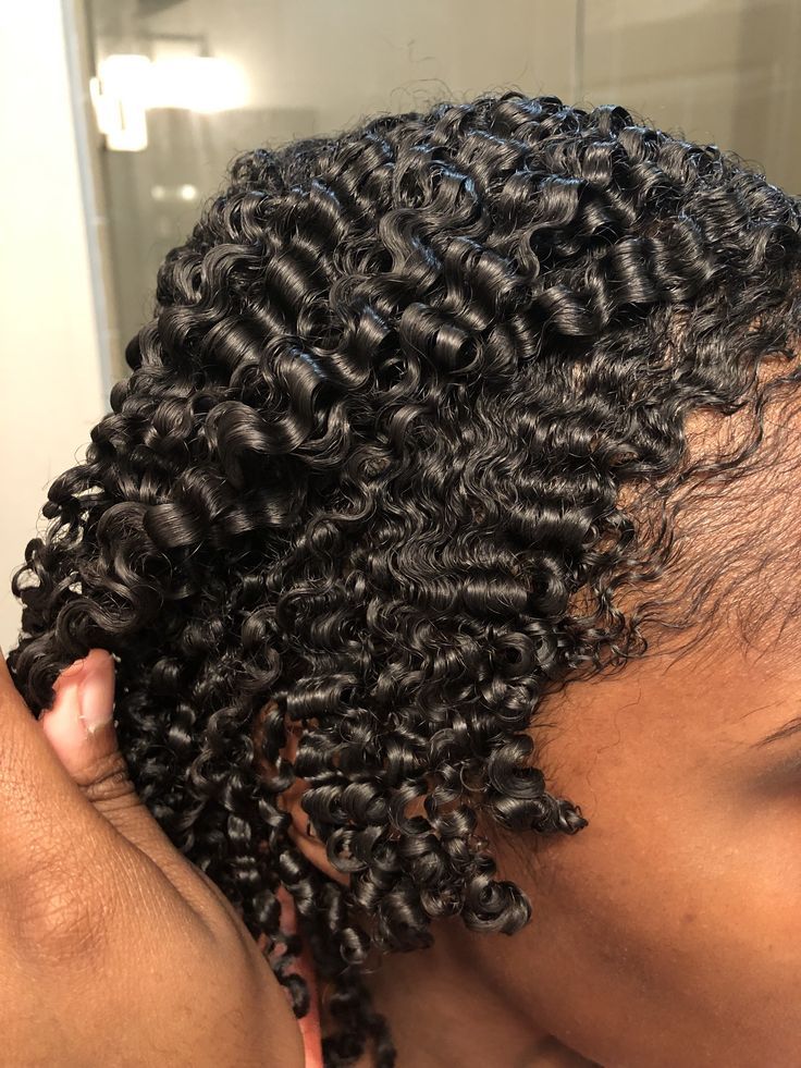 a girl with curly hair