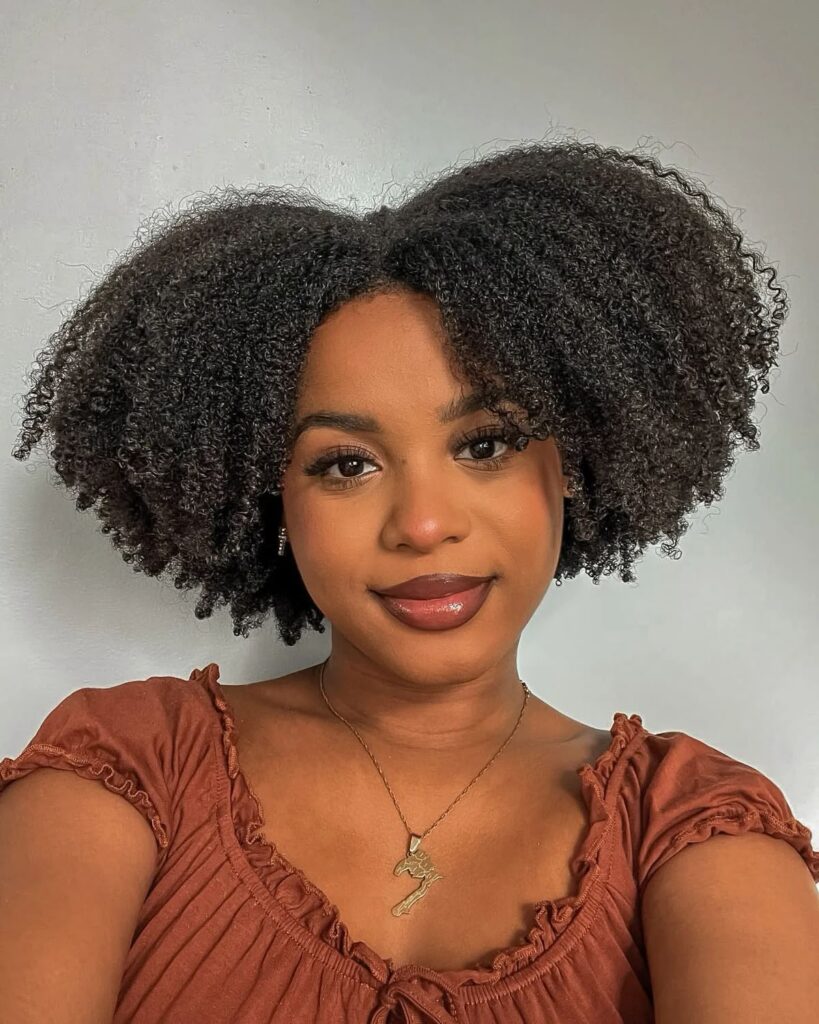 a pretty girl with type 4 hair