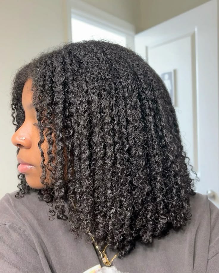 a girl with a curly hair