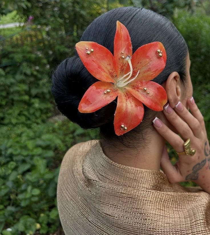 a girl with decorated bun