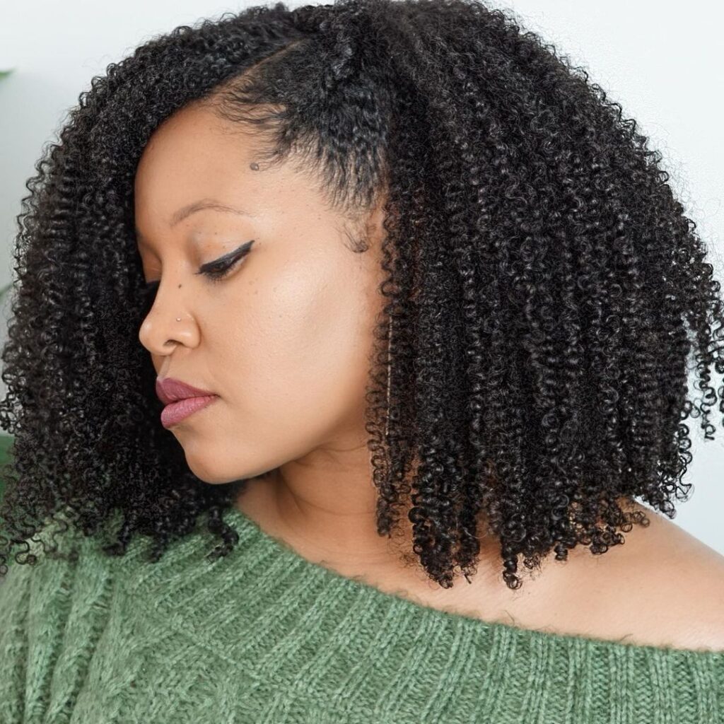 Girl with one of the most defined wash and go hairstyles for Type 4 hair.