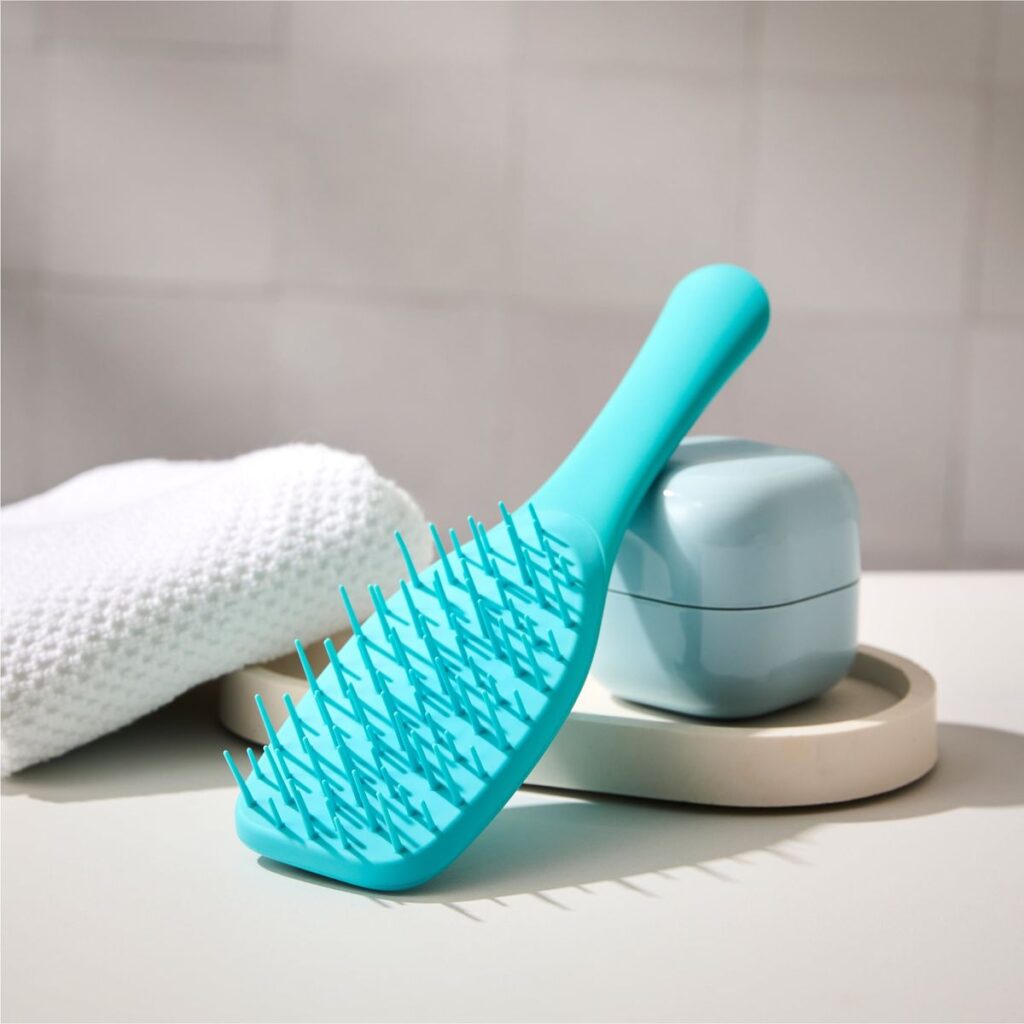 a wide tooth brush the best detangling brush for afro hair