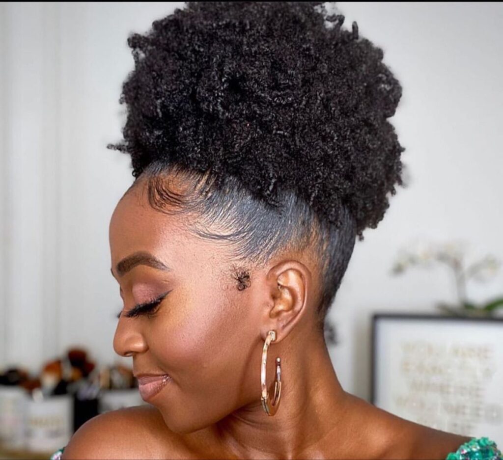 a girl with elevated hair with full glam