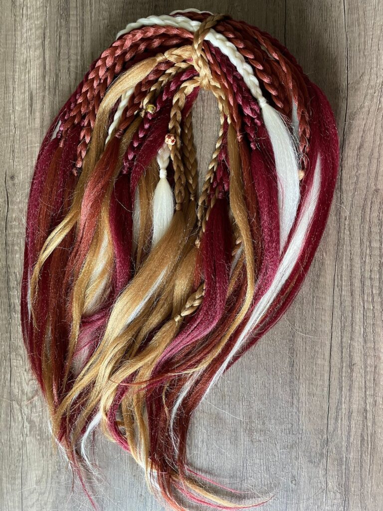 picture of different colors of extension for braiding
