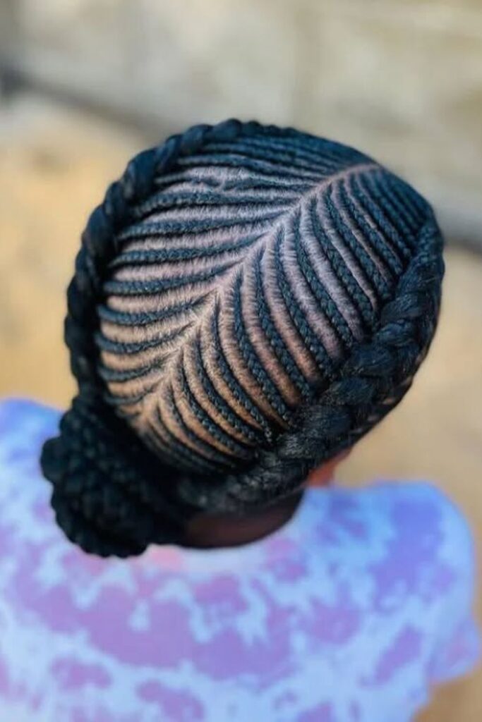picture of a center part feed in braids