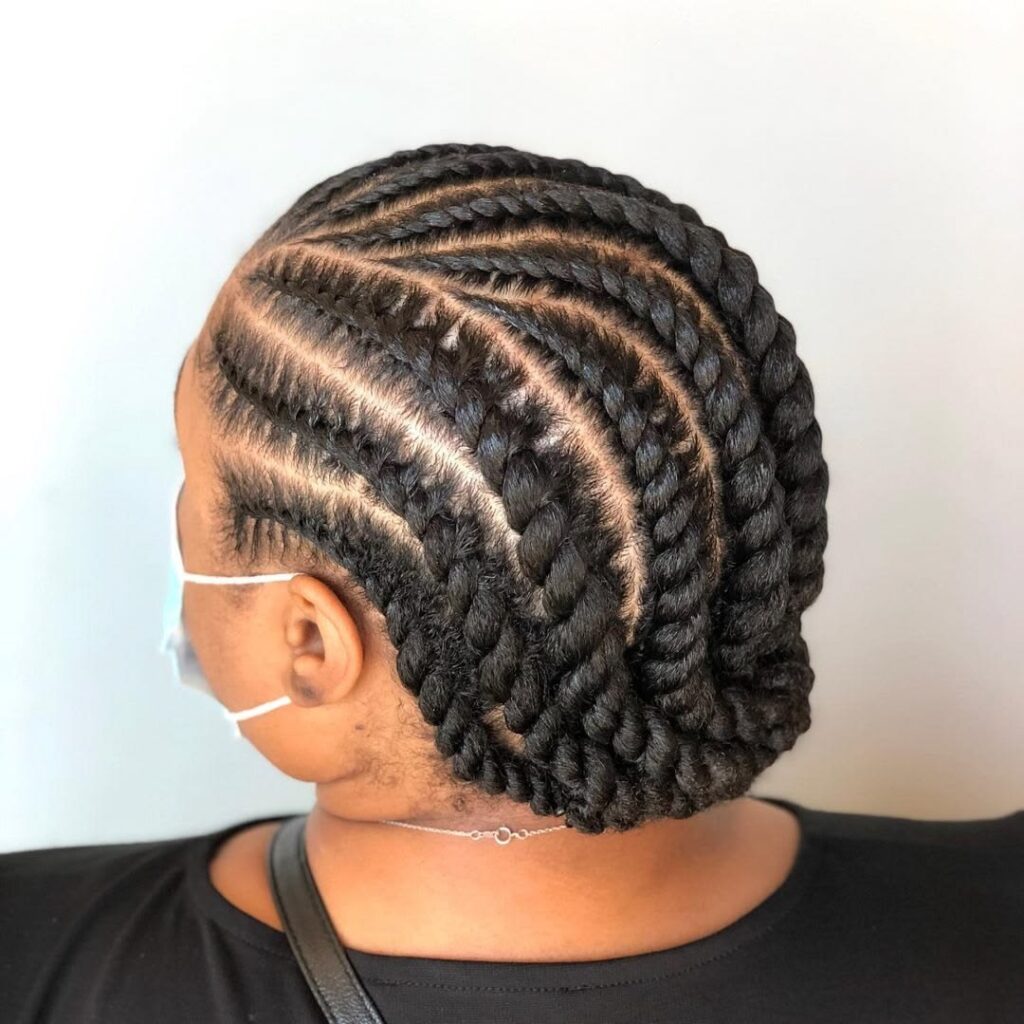 a lady with flat twists simple beginners afro hairstyle