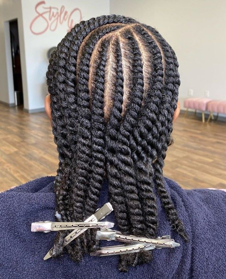 someone with flat twist hairstyle