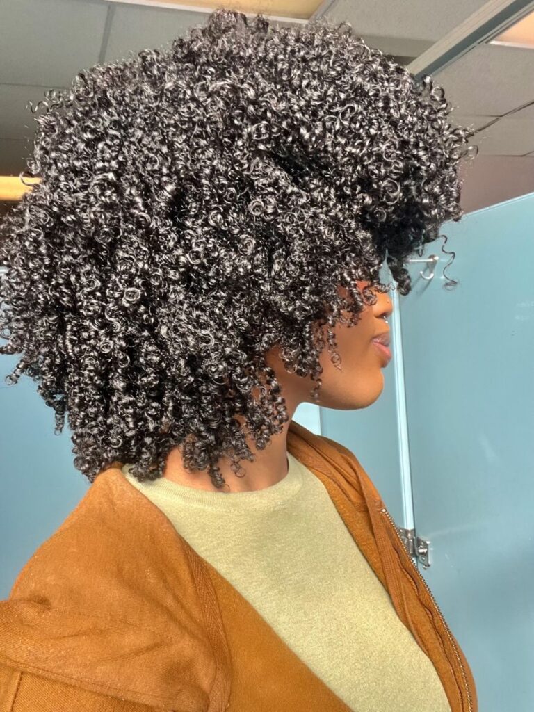 girl with full afro curl
