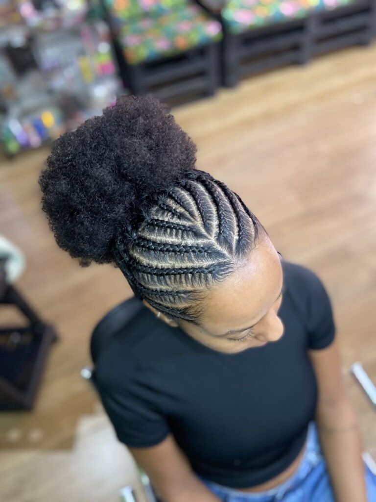 a girl with gathered cornrow