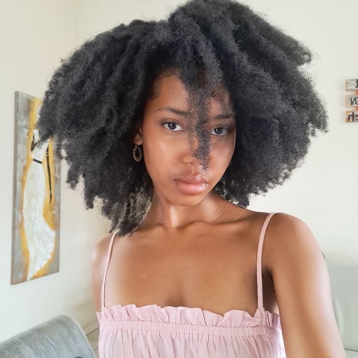someone with afro full hair