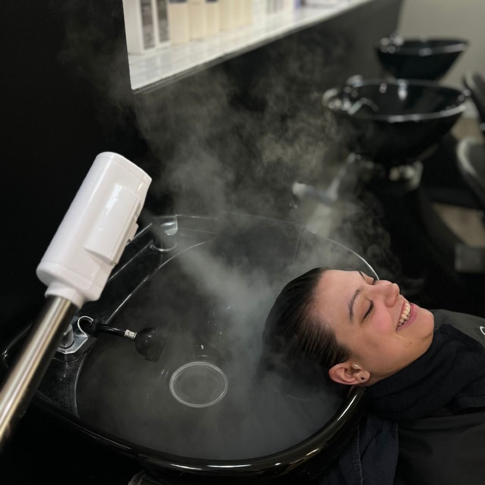 someone steaming her hair