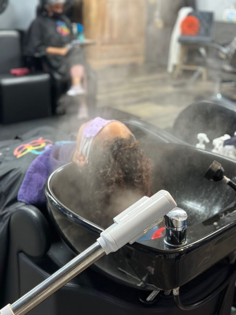 someone steaming her hair