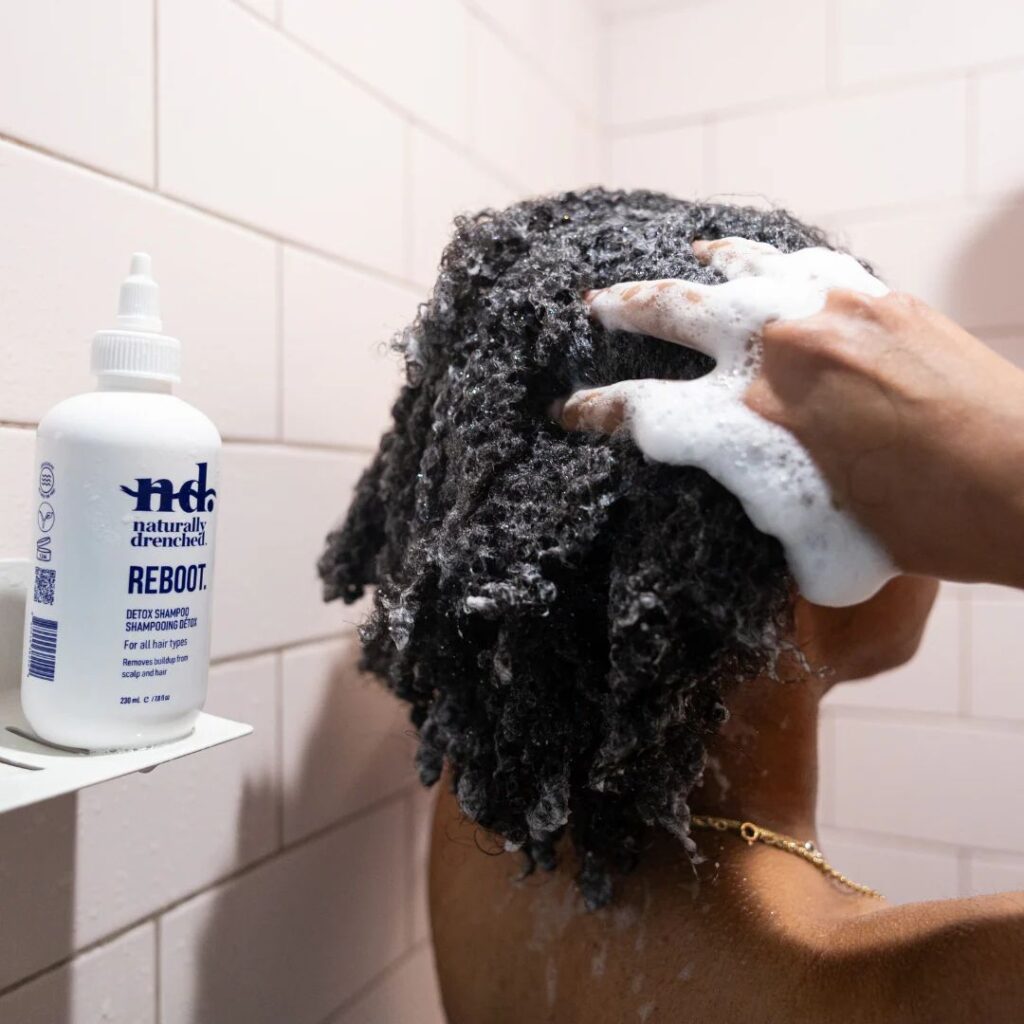 someone washing her hair
