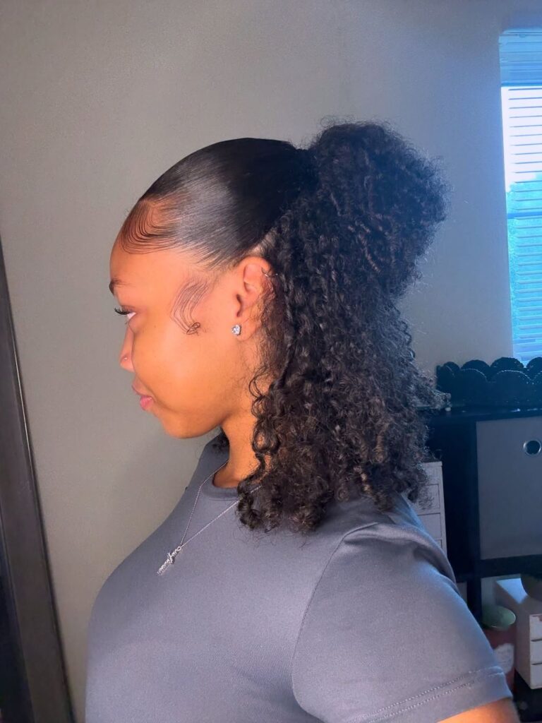 a girl with half up half down quick natural hairstyle