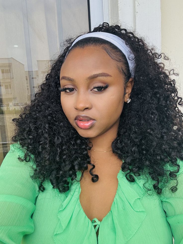 a girl with half wig with natural edges