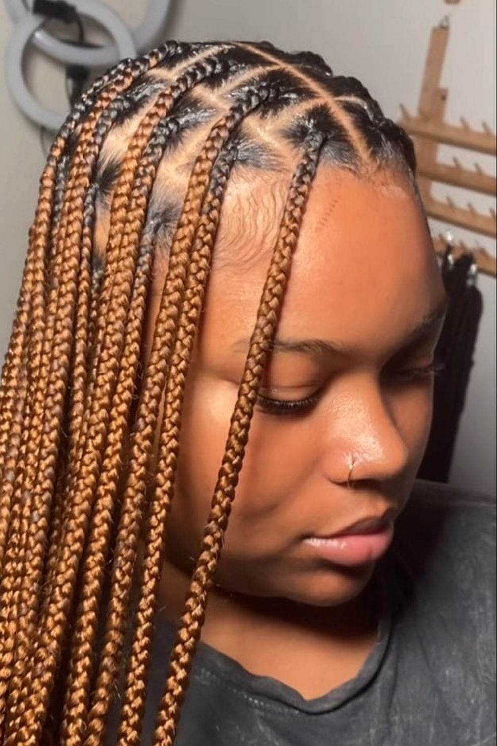 a girl with knotless braids