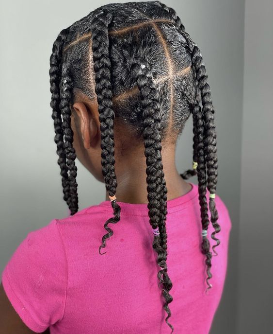 a girl wit knotless braids with large sections