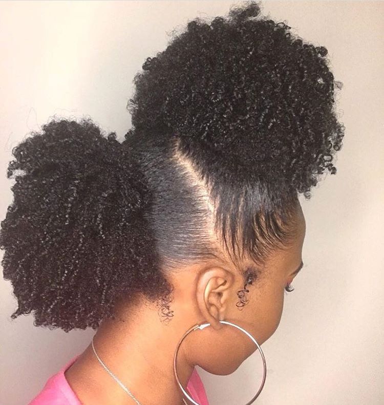 a girl that packed her hair into two, one is above, the other is lower