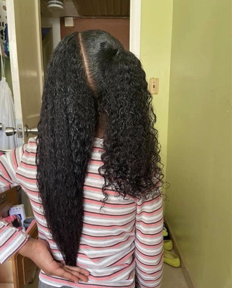 someone with long curly hair