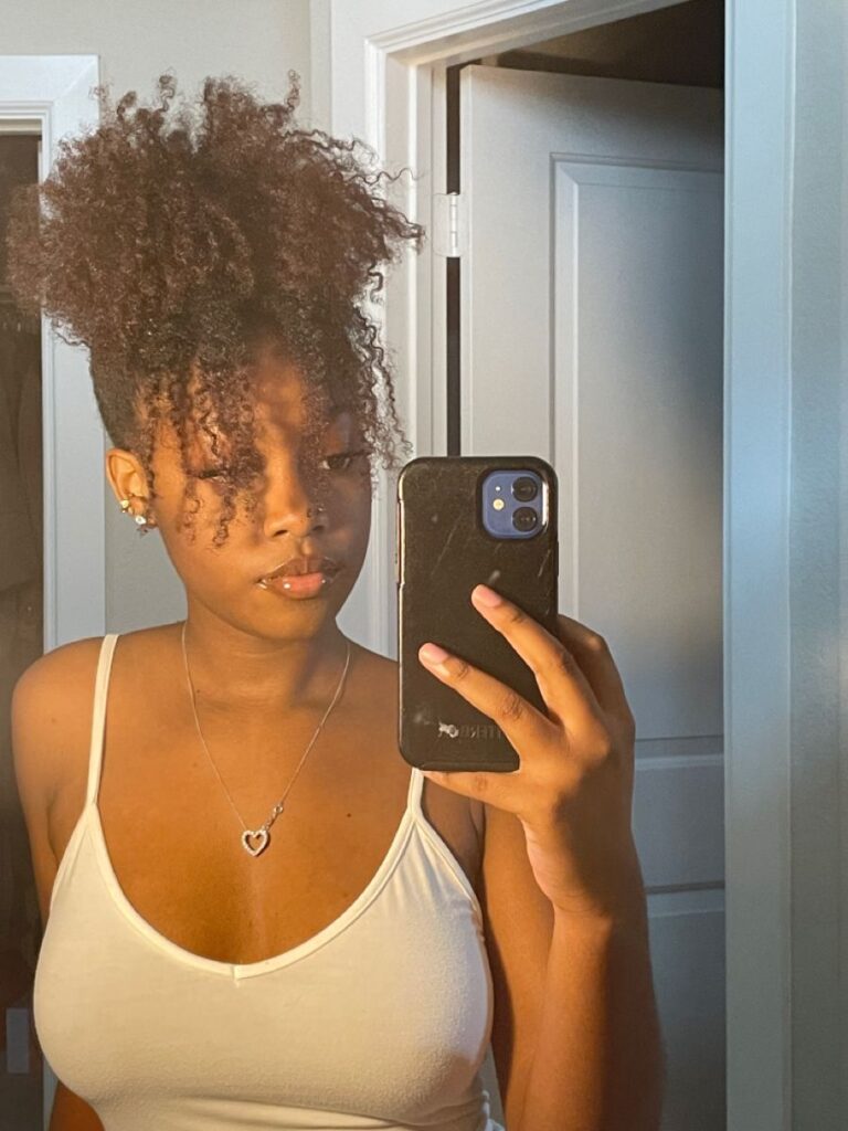 a lady with pineapple hairstyle
