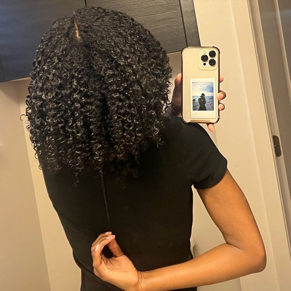 someone with a moisturized hair