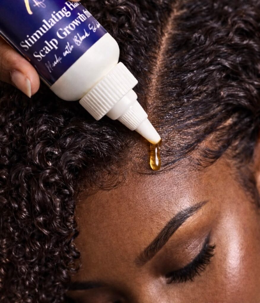 picture of someone moisturizing her scalp