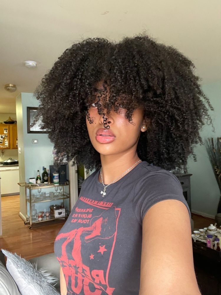 a girl with natural hair