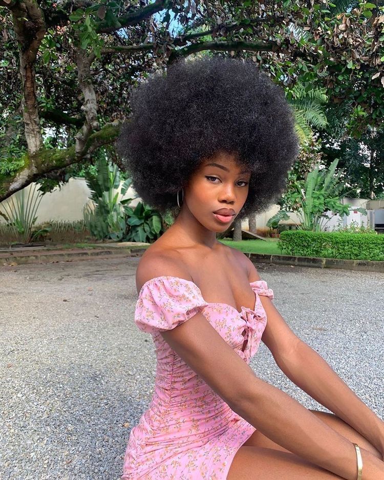 a girl with natural hair
