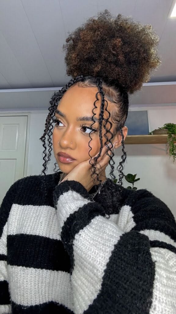a pretty girl with her protective styling natural hairstyle