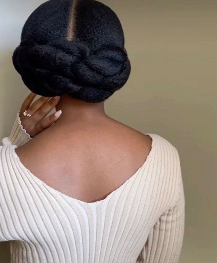 someone with pinned twist updo