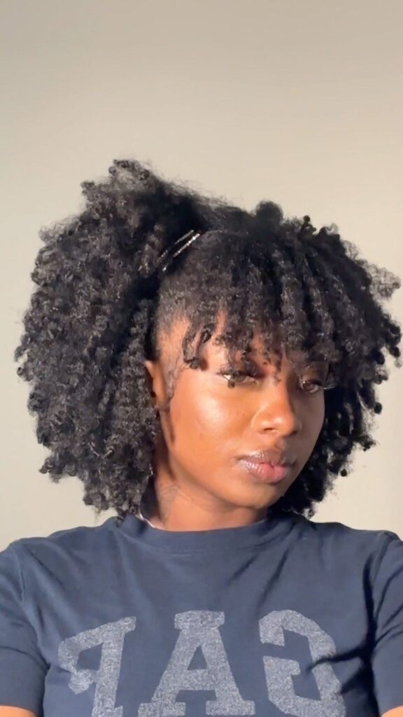 picture of a girl with pinned twist out