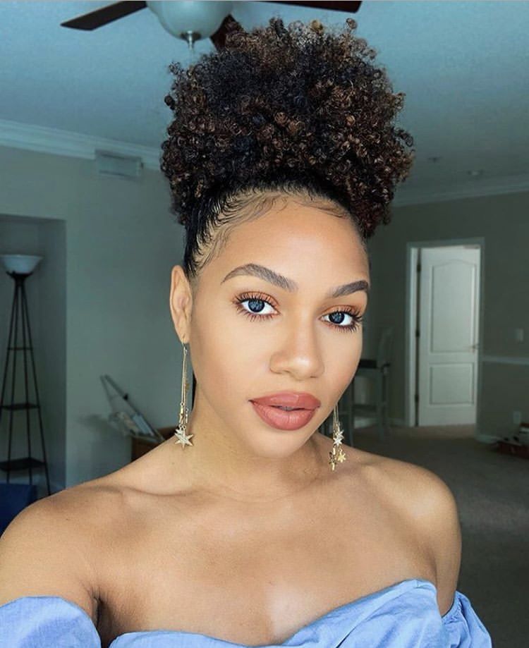 beautiful girl with puff with edges laid